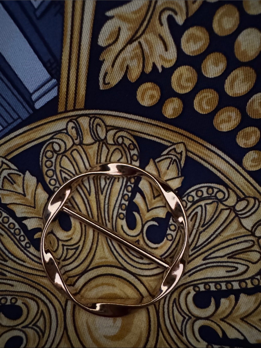 Gold tone scarf ring